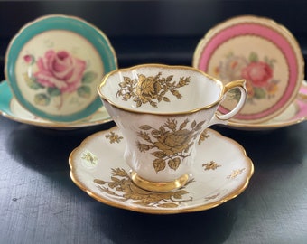 Royal Albert teacup and saucer, beautiful, embossed  gold rose pattern, heavy gilt, corset shape, 1940's tea-time, collectable cup, british