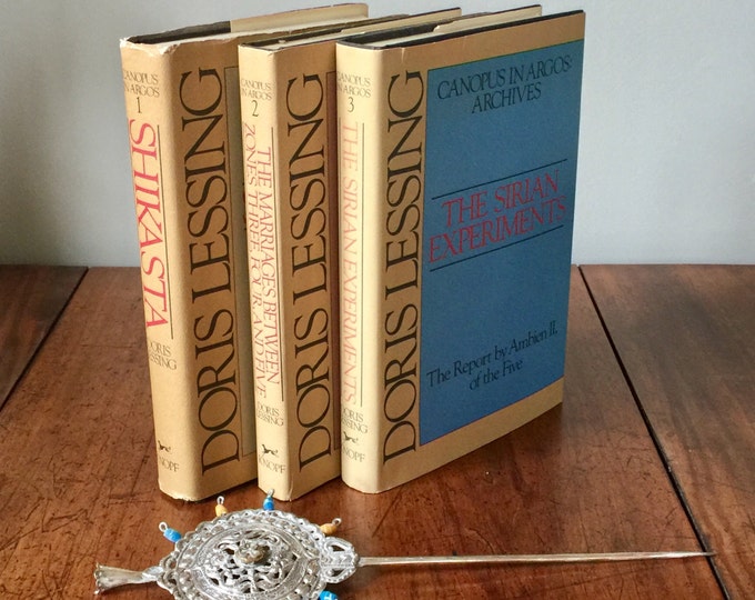 Canopus in Argus, by Doris Lessing, volumes 1 - 3, first edition, hardback, vintage, dust jacket, science fiction, nobel prize,
