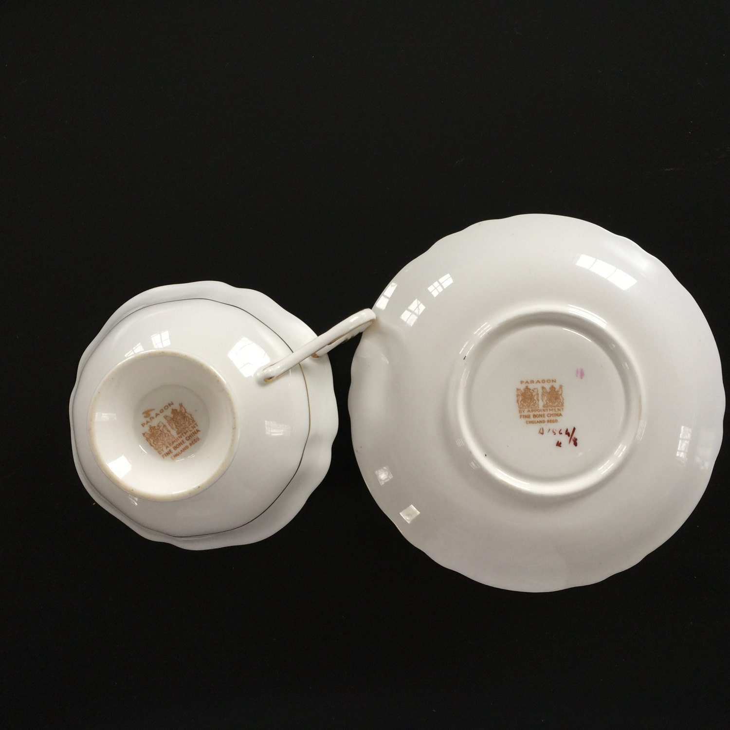 Fabulous pale green Paragon cup and saucer, decorated with ...
