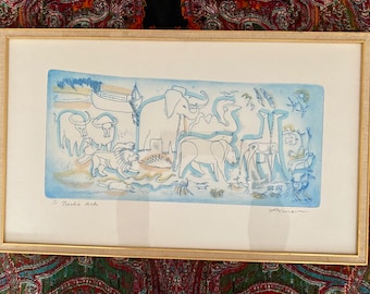 May include: A framed print of a blue and white illustration of Noah's Ark with animals, including elephants, lions, and giraffes. The print is signed "Amen" in the bottom right corner and "Noah's Ark" in the bottom left corner.