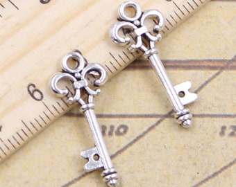 50 Stück Schlüssel Charms Anhänger 24x11mm Antik Silber Ornament Zubehör Schmuckherstellung DIY Handarbeit Basismaterial