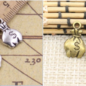 soldi borsa pendente accessorio 19 * 11mm