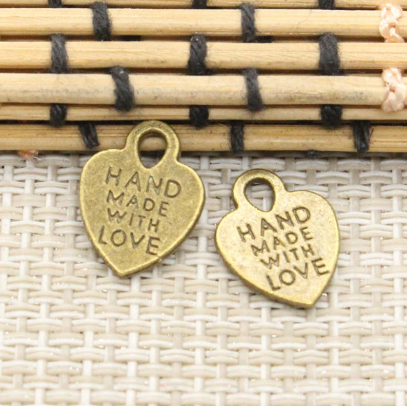 50pcs Letter Hand Made with love Hanging Tag Heart Pendant 15x12mm bronze jewelry charms jewelry making DIY handmade craft base material Antique bronze