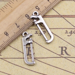 40pcs Saw charms pendant 25x7mm antique silver ornament accessories jewelry making DIY handmade craft base material