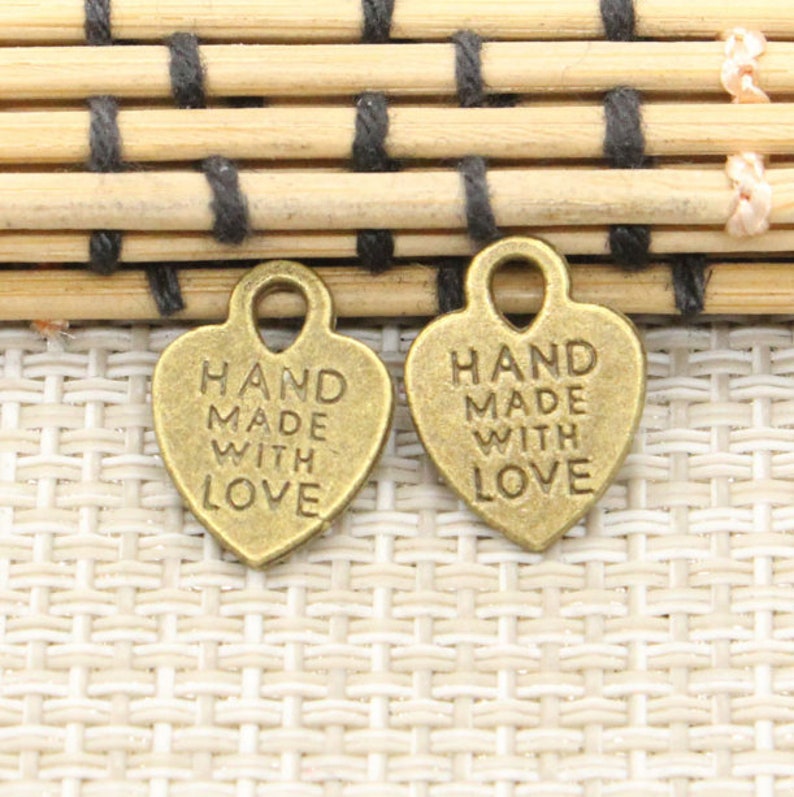 50pcs Letter Hand Made with love Hanging Tag Heart Pendant 15x12mm bronze jewelry charms jewelry making DIY handmade craft base material image 1