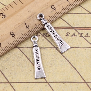 30 Stück Zahnpasta Charms Anhänger 28 x 6 mm Antik Silber Ornament Zubehör Schmuckherstellung DIY Handarbeit Basismaterial