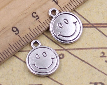 30 Uds. Colgante de dijes de cara sonriente 12mm accesorios de adorno de plata antigua fabricación de joyería DIY material base artesanal hecho a mano