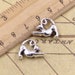 see more listings in the Antique Silver Charms section