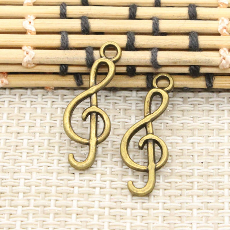 Note Charms 50pcs Musical Note Charms Pendant 25x9mm Bronze Ornament Accessories ...