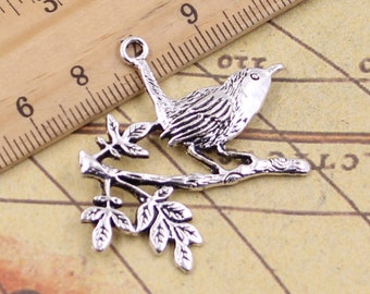 10 pièces Un oiseau debout sur la branche pendentif à breloques 35x42mm antique argent ornement accessoires fabrication de bijoux bricolage fait main artisanat base