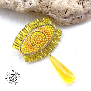 Eye-Catching yellow brooch with gorgeous beadwork