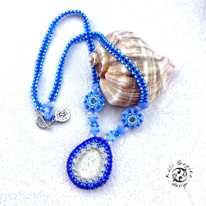 Blue Beaded necklace with stone and crystals