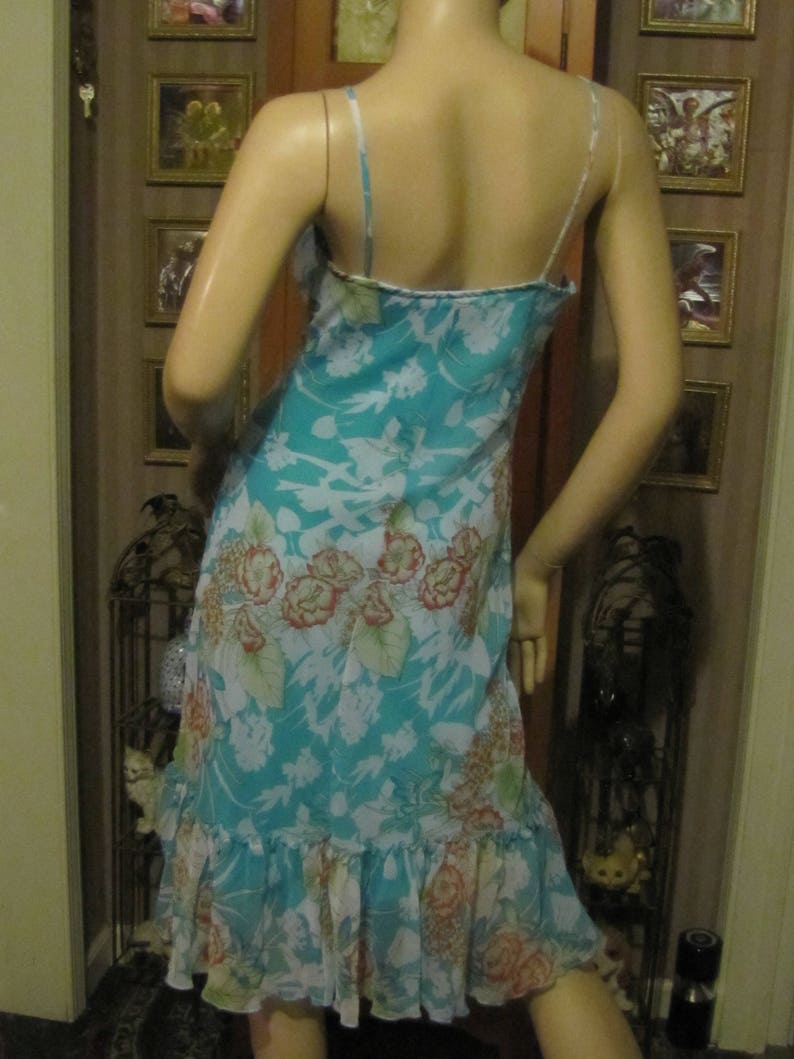 Darlin Aqua Floral Dress with Ruffled Hemline in size 78 Pretty B