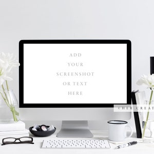 May include: A white desk with a computer monitor, keyboard, mouse, two white candles, two vases with white flowers, a black lamp, a white mug, a black bowl with small items, a pair of glasses, and a pen. The computer monitor has a white background with the text "ADD YOUR SCREENSHOT OR TEXT HERE".