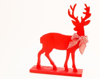 Red Reindeer Wooden Cutout Holiday Decoration, hand painted with tied striped bow, perfect for candy stripe or woodland themes