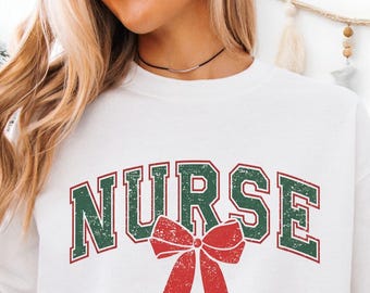Vintage Varsity Nurse Sweatshirt, Coquette Bow Nurse Christmas Shirt, Cute Holiday RN Scrub Outfit, Cozy Festive Winter Nurse Sweater