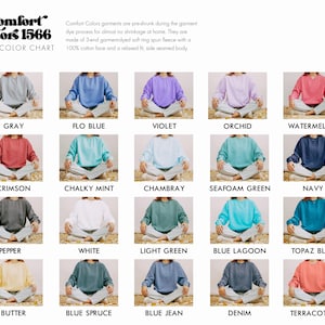 May include: Color chart of Comfort Colors 1566 sweatshirts in various colors, including gray, blue, violet, orchid, and watermelon. The chart displays the color options available for the garment-dyed fleece sweatshirts.