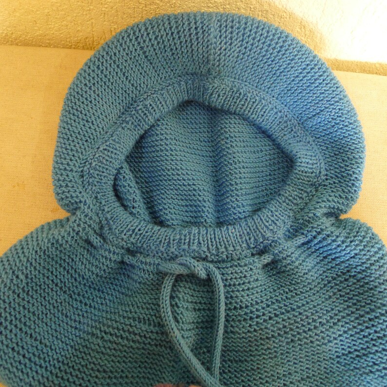 Hand knitted hoodbiggin.Natural wool