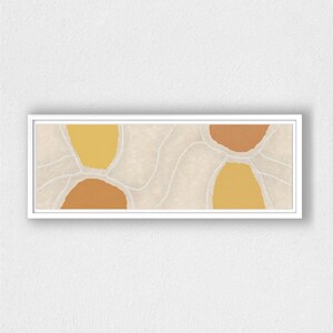 May include: Abstract art print with a white background and yellow and orange shapes. The shapes are outlined in white and have a textured look.