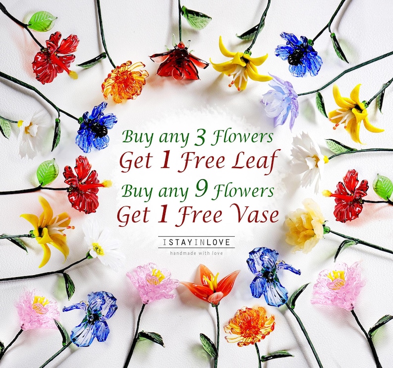 May include: A selection of vibrant glass flowers in various colours, including red, orange, yellow, blue, white, and pink, displayed on a white background. The image features text: "Buy any 3 Flowers Get 1 Free Leaf Buy any 9 Flowers Get 1 Free Vase."