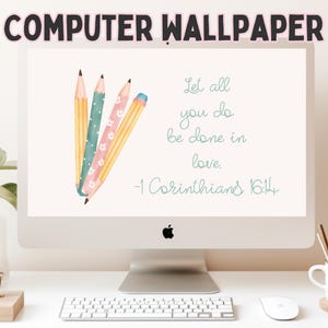 May include: A computer wallpaper displayed on a monitor screen featuring a cluster of four colored pencils and the text Let all you do be done in love. 1 Corinthians 16:14 written in a teal script font against a light cream background.