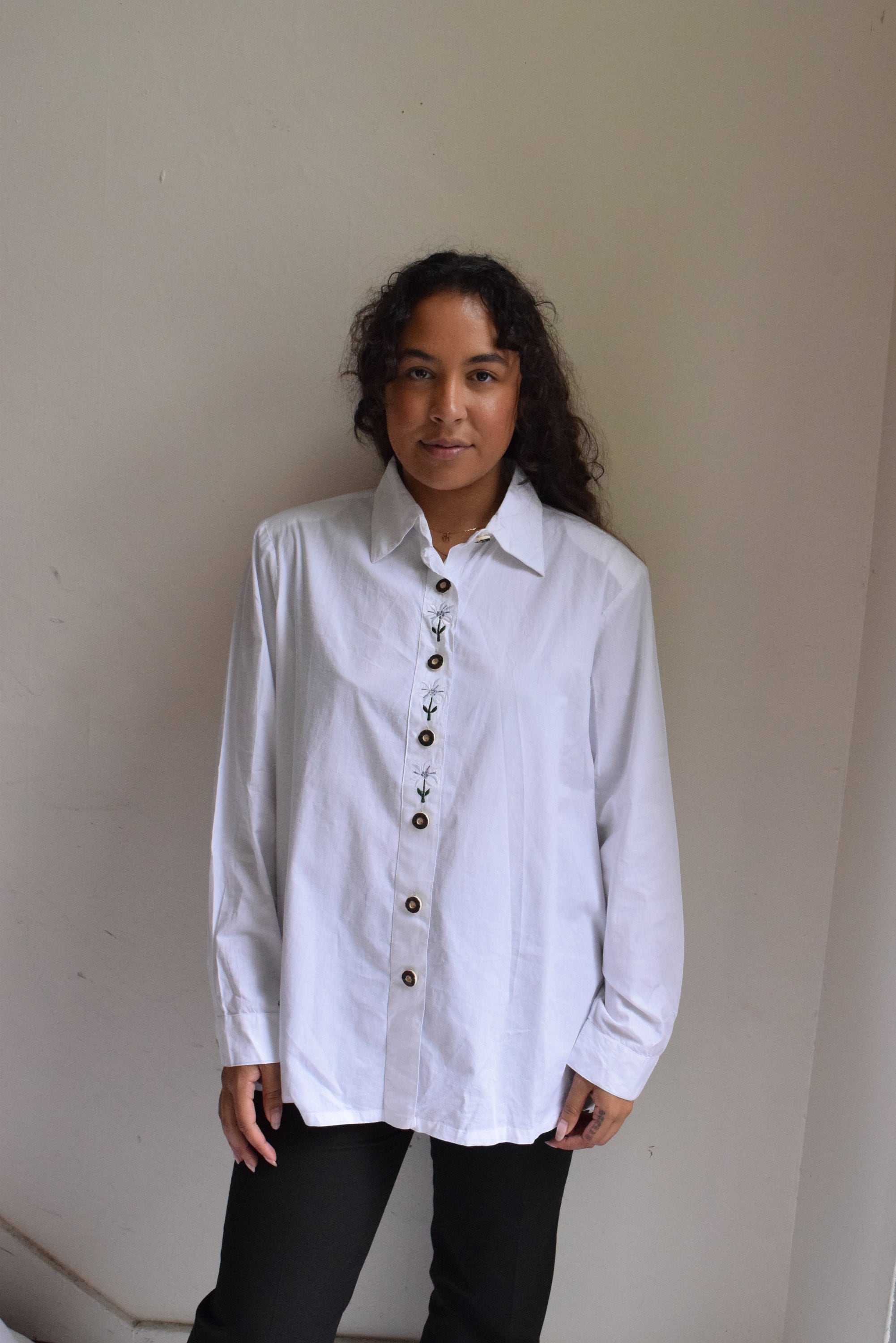 Floral embroidered white cotton blouse