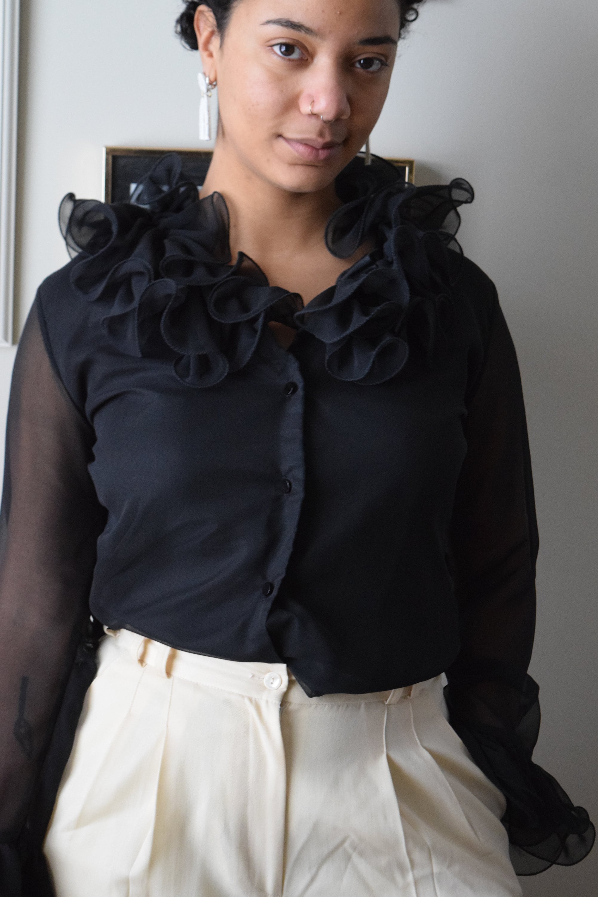white and black ruffle blouse