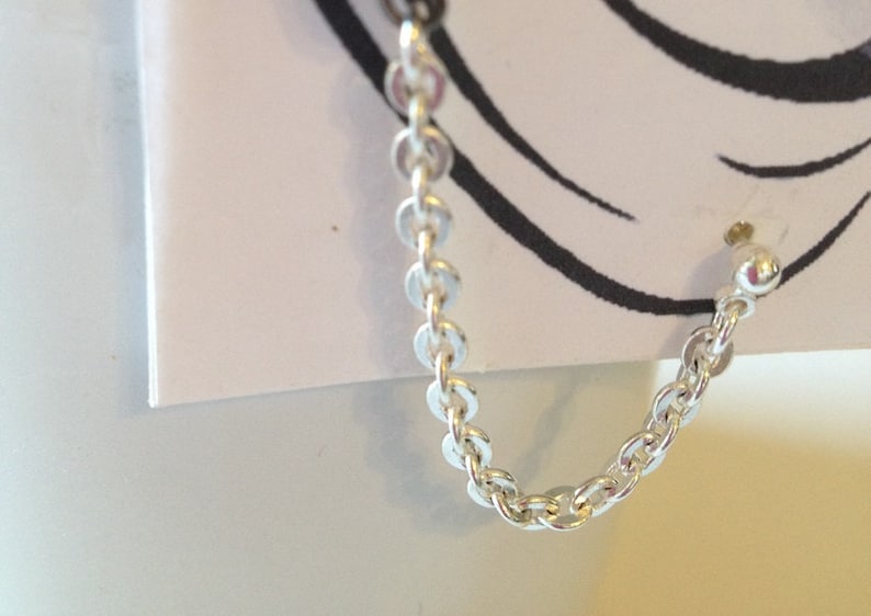 Boucles d'oreilles deux trous, Boucles d'oreilles billes noires