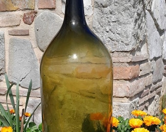 Old Italian Carboy demijohn, giant bottle blown glass, old wine bottle, flask, nature inspired