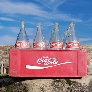 17" Collectible Coca-Cola 1 liter Glass Bottles and Basket, Plastic Coke Holder and 12 bottles Text all around, cola Adv chest basket, Retro