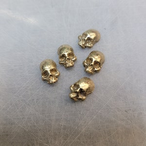 Brass skulls