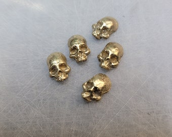 Brass skulls