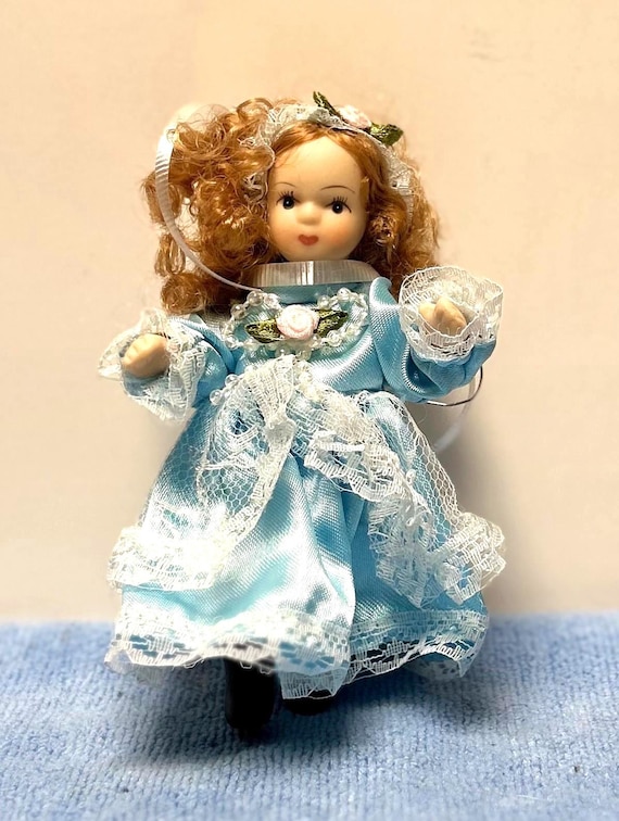 doll with red hair and blue dress American Girl Disney Princess Ariel Day Dress, Flounder & Accessories for  18-inch Dolls