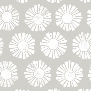 May include: A seamless pattern of white sun shapes with smiling faces on a light gray background.