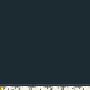 May include: A solid dark blue fabric swatch with a ruler measuring 8 inches.