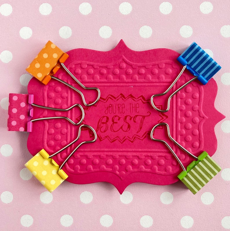 Binder clips. Cute mini coloured foldback clips that are great Etsy