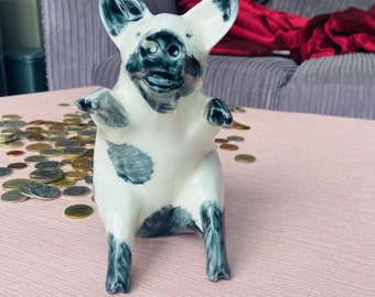 Dirty piggy bank, funny money box