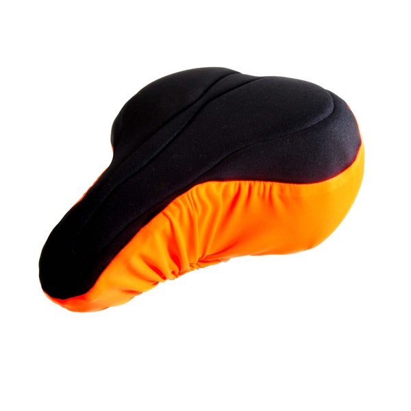 Housse de selle de vélo orange rembourrée avec textiles respectueux de l'environnement. Propriétés de la mousse de haute technologie pour un soutien et un confort maximum. Coupe anatomique pour HOMMES