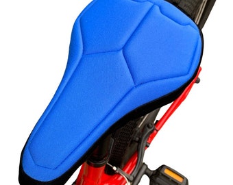 Kids Blue and Black Padded Bike Seat Cover from eco friendly textiles. High tech foam for maximum support and a water resistant base