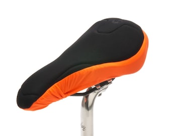 Black and Orange Padded Bike Seat Cover with eco friendly textiles. High tech foam properties for maximum support. Anatomic fit for WOMEN