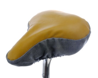 Dijon, a stylish bicycle saddle cover with a splashproof base to keep you protected, comfortable and looking & feeling, oh so good!