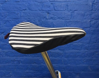 Humbug | Premium Bicycle Saddle Cover | Water resistant Lining | Stripy & Black Leather | Slim Bike Seat Cover | Cycling Protection, Comfort