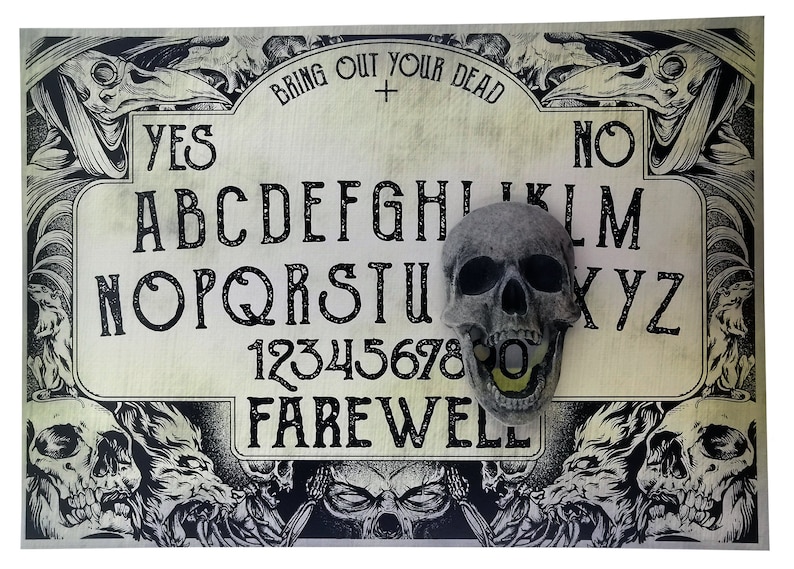 May include: A vintage-style Ouija board with a skull resting on the planchette. The board features the letters of the alphabet, numbers 1-9, and the words "Yes", "No", and "Farewell".
