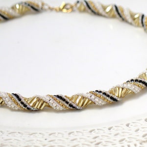 Statement black gold necklace, Spiral hand beaded necklace