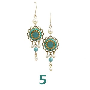 May include: A pair of gold dangle earrings with turquoise and white beads. The earrings feature a round turquoise stone surrounded by gold beads and a floral design.