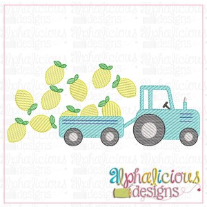 May include: A blue tractor with a wagon full of yellow lemons. The lemons are spilling out of the wagon and rolling on the ground.