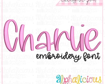 May include: Pink embroidery font design for the name "Charlie" with the text "exclusive font" and "embroidery font" in black. The image also includes the text "alphalicious designs" with a pink heart and a spool of thread.