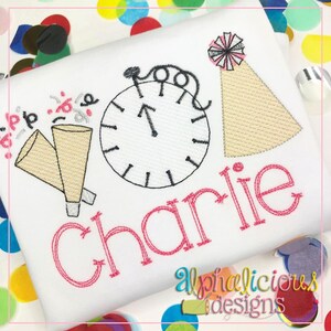 May include: Embroidered design featuring a clock, party hat, and two party blowers with the name "Charlie" in pink lettering. The design is on a white fabric background.