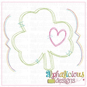 May include: A green shamrock with a pink heart in the center. The shamrock is outlined in green thread and the heart is outlined in pink thread. The image is on a white background.