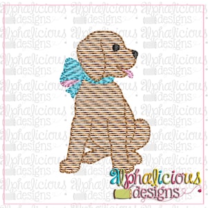 May include: A brown and white striped puppy with a blue and pink bow sitting on its hind legs. The puppy is looking to the right and has its tongue sticking out.